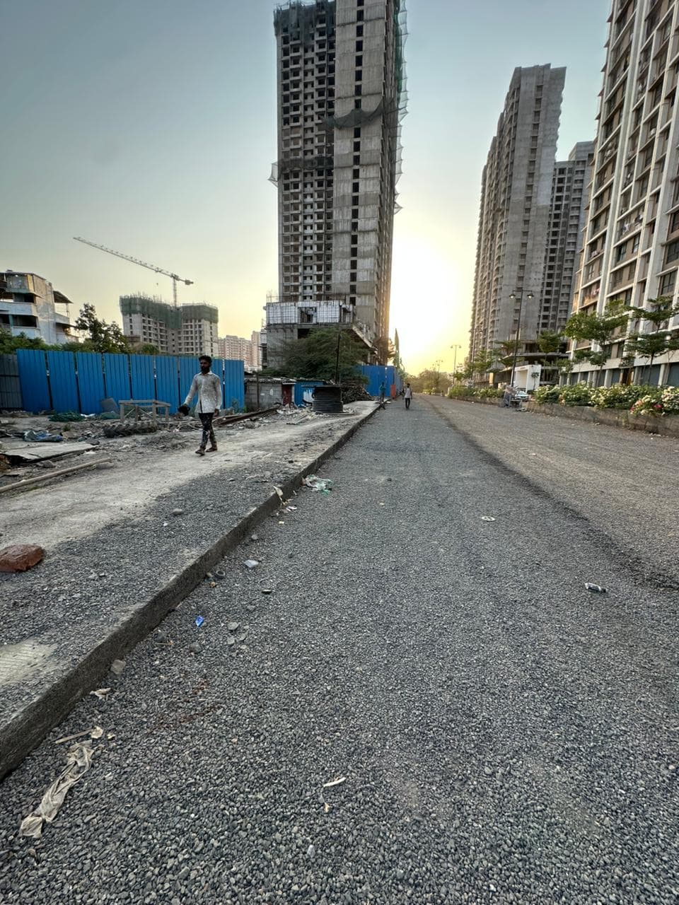 Road construction project at sunset